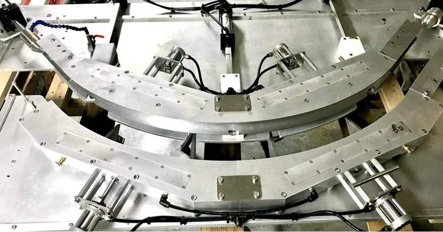 Curved aluminum part fixture with pneumatic clamps