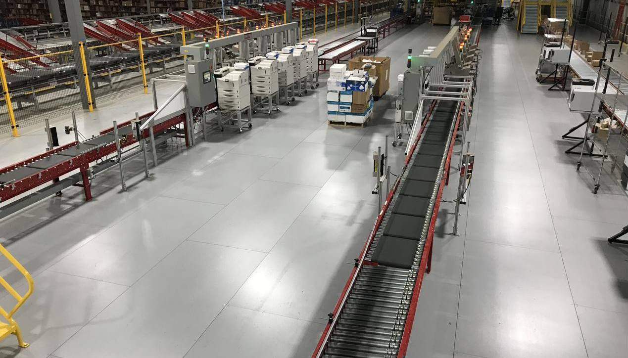 Robot Risers sorting and print line installed in a distribution center