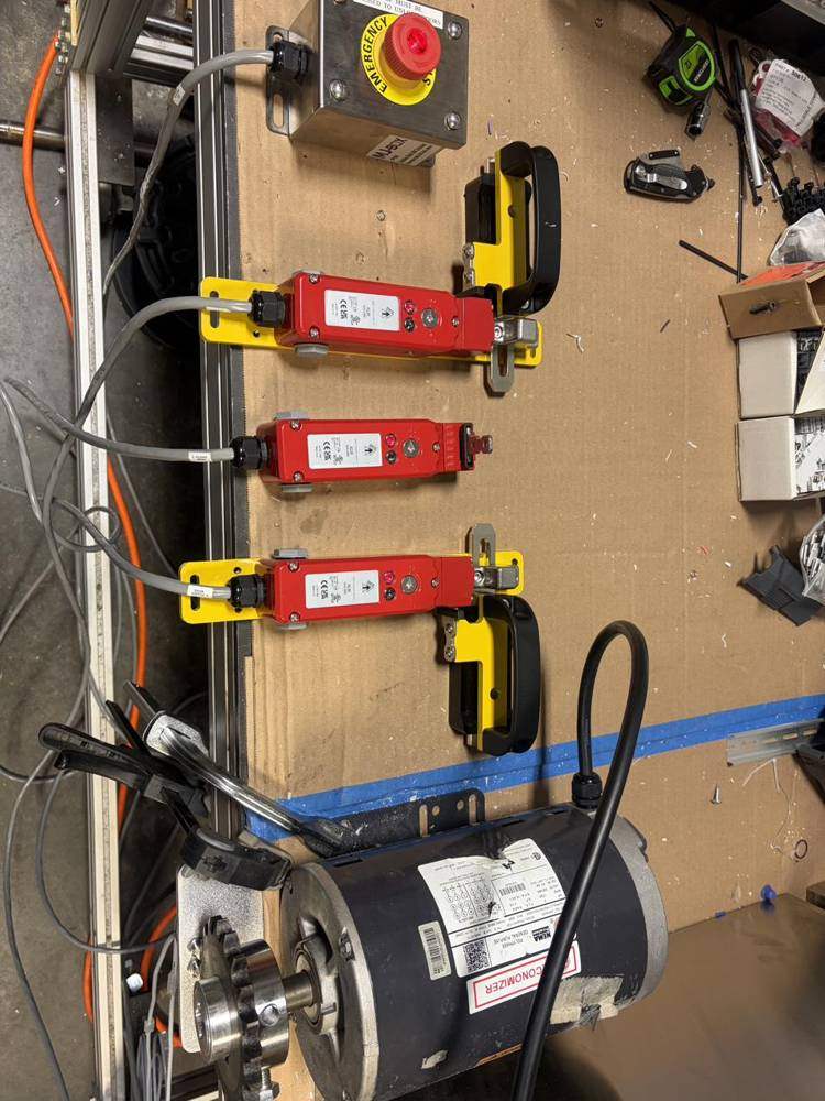 Safety interlock switches mounted on a panel