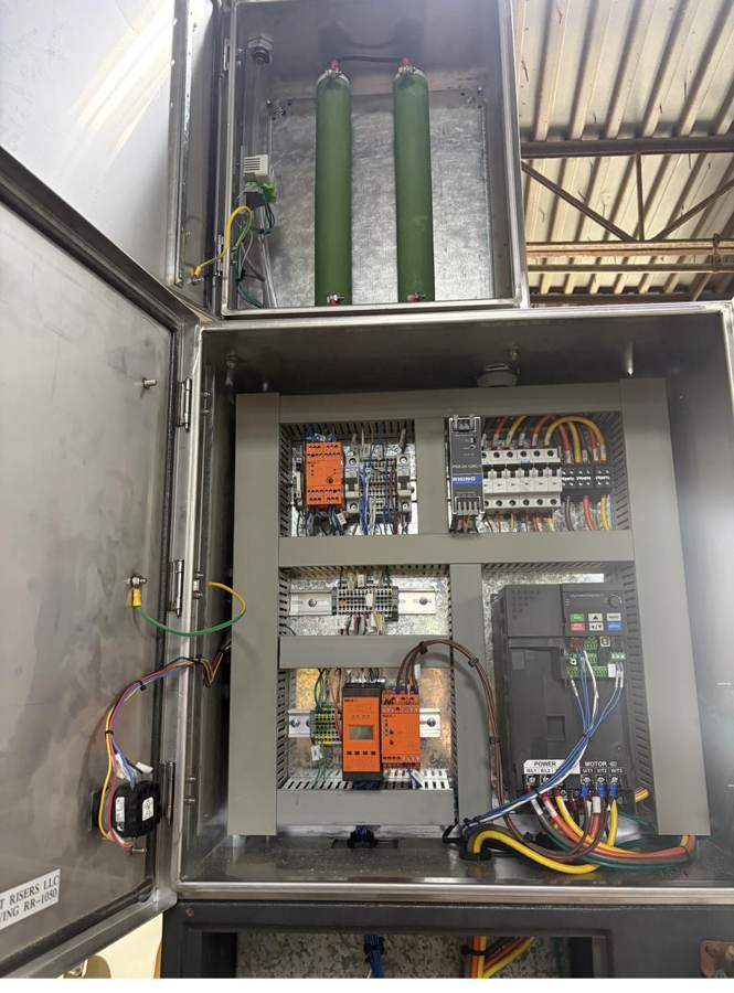 Open control panel with drives and terminals
